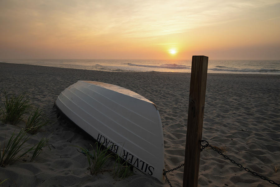 Silver Beach Lifeguard Boat at Sunrise Photograph by Matthew DeGrushe