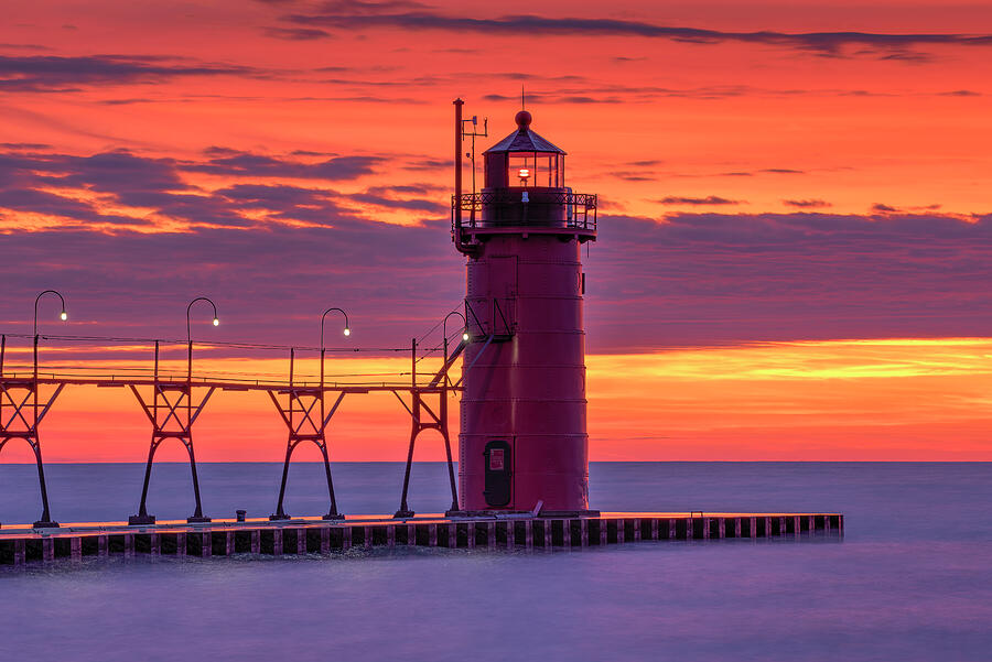 South Haven South Pier Light After Sunset Photograph by Michael Collins