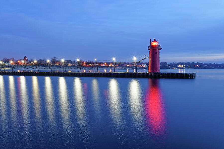 South Haven South Pier Light Reflections Photograph by Michael Collins