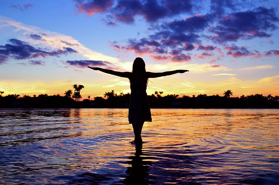 Silhouette at Sunset on the Water Photograph - Spirit by Laura Fasulo