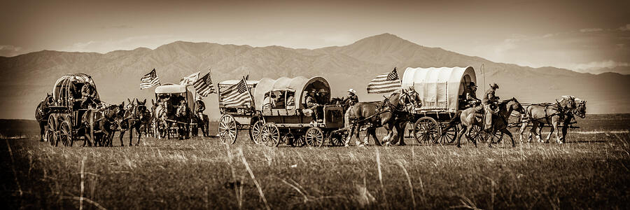 Stars, Stripes and Covered Wagons-Sepia Photograph by Carla E