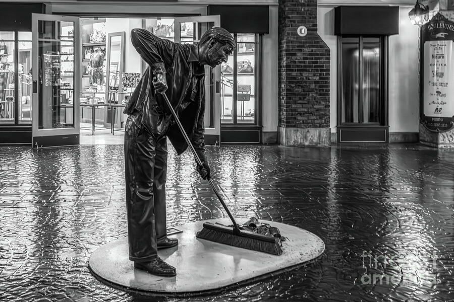 Street Sweeper Bronze Statue in Black and White - Paris Las Vegas Photograph by Tatiana Travelways