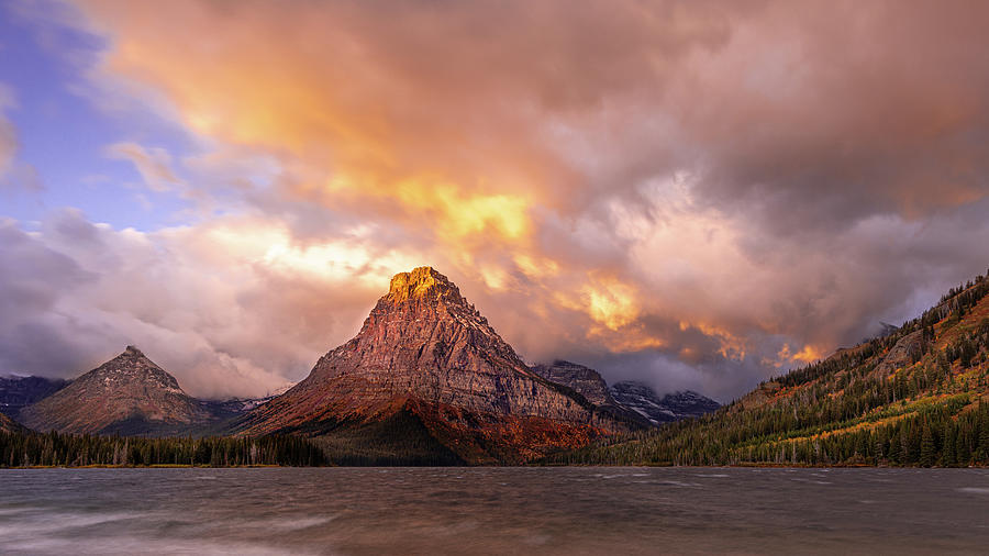 Sunrise on Two Medicine Lake Photograph by Richard DeYoung