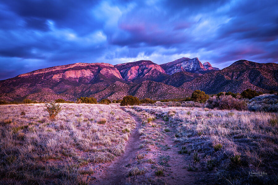 Sunset Over Mountain Ridge Photograph - Twilight Road Sandia Mountains by Howard Holley