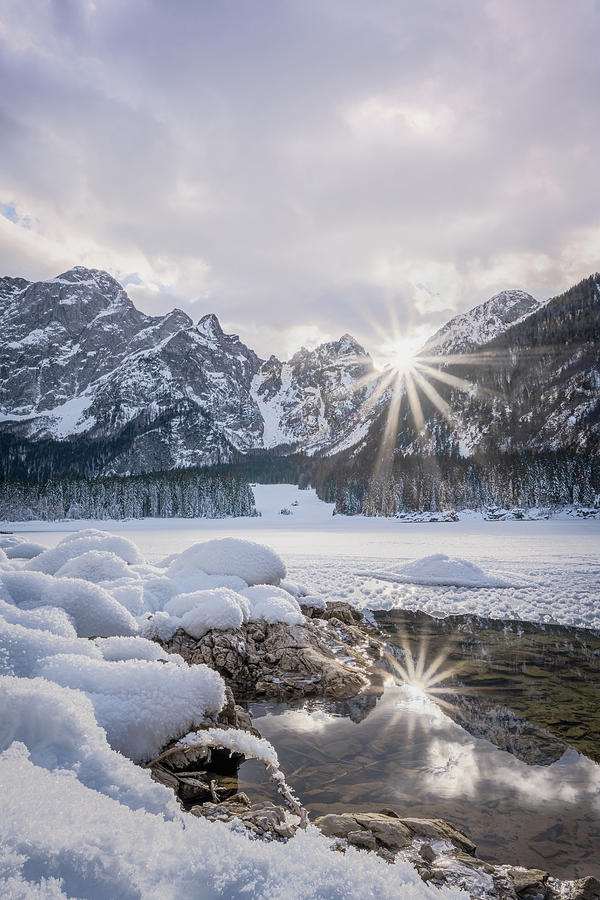 Sunstar Reflections on Frozen Mountain Pool Photograph by Charnwood Photography Fine Art