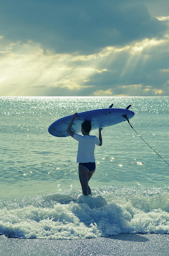 Surfer Walking into the Ocean Photograph - Surfer Girl by Laura Fasulo
