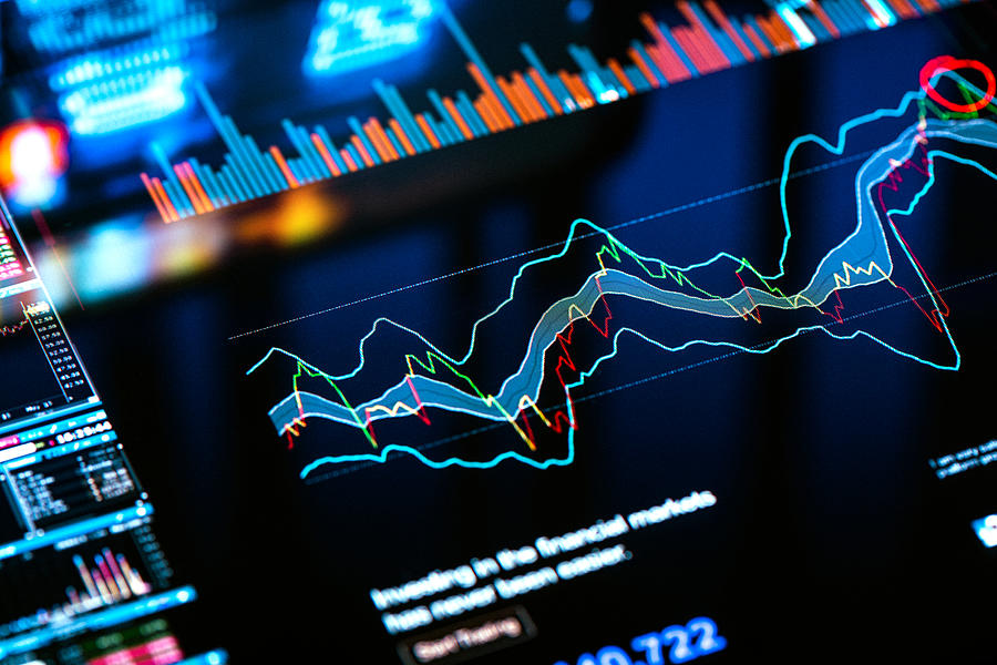 Trading charts background Photograph by Da-kuk