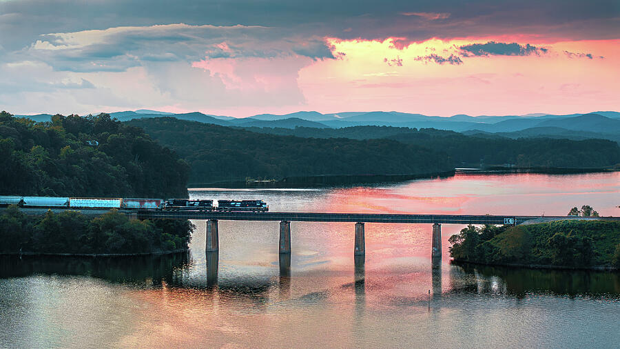 Train at Sunset Over Tranquil Waters by Blue Ridge Horizons
