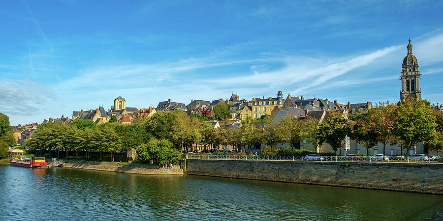 View over the River Sarthe to the buildings of old town Le Mans. Photograph by Seeables Visual Arts