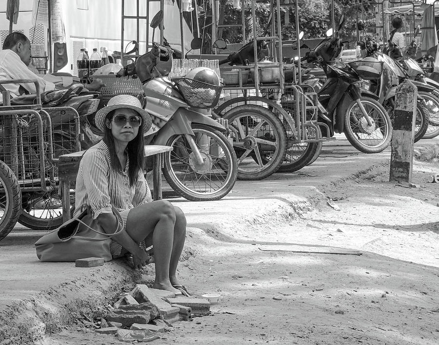 Waif - Poor destitute girl waiting for a lift sitting in the gut Photograph by Jeremy Holton