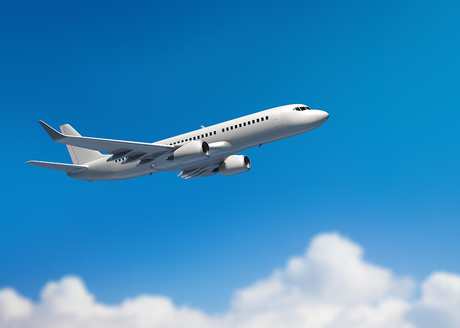 White mid-sized passenger jet airplane Photograph by Spooh