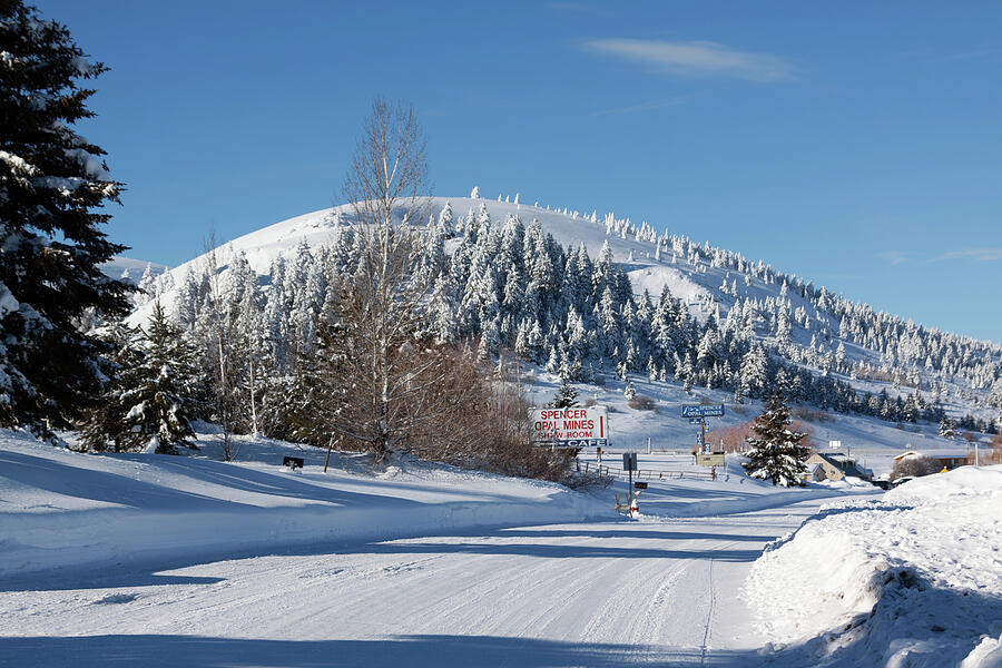 Snowy Road Leading to Hills Photograph - Winter Scene in Spencer Idaho - Opal Mines Road by Tatiana Travelways