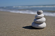Stack of pebbles on beach #1 Photograph by Sami Sarkis Photography