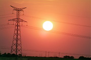 Electrical pylon at silhouetted at sunset Photograph by Sami Sarkis Photography