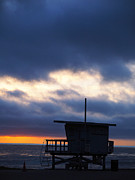 End Of Day On the Pacific. The sun sets on the Royal Palms Lifeguard shack. Photograph by Joe Schofield