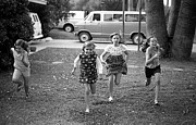 Four Girls Racing, 1972 Photograph by Jeremy Butler