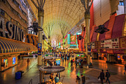 Fremont Street with many neon lights and tourists in Las Vegas Photograph by Miroslav Liska