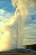 Yellowstone Old Faithful Sunset Eruption Photograph by Adam Jewell