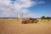 Abandoned car wreck in Solitaire located in the Namib Desert of Namibia #1 Photograph by Miroslav Liska
