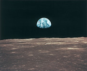 Planet Earth Viewed From The Moon Zip Pouch by Stockbyte - Photos.com