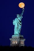 Supermoon Statue Of Liberty Photograph by Susan Candelario