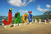 Colorful entry Sign for the city of Jaco in Costa Rica #1 Photograph by Miroslav Liska