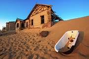 Empty bathtub in Kolmanskop ghost town, Namibia #1 Photograph by Miroslav Liska