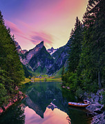 Sunset over the Seealpsee lake with small boats in the Swiss Alps, Switzerland #1 Photograph by Miroslav Liska