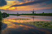 Sunset above old dutch windmills in Kinderdijk, Netherlands #3 Photograph by Miroslav Liska