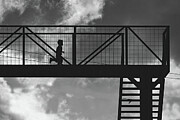 Boy running on highway bridge in Guatemala BW Photograph by Tatiana Travelways