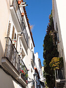 Charming Alley Sitges Spain Balcony Print Mediterranean White Architecture Color Fine Art Photograph Photograph by Travel Essayist