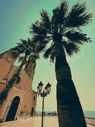 Church Sant Bartomeu i Santa Tecla with Palm Trees and Vintage Street Lamps in Sitges Spain Photograph by Travel Essayist