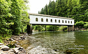 Crossing the McKenzie River Photograph by Tom Cochran