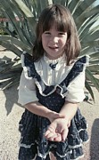 Girl with Tooth and Cactus Photograph by Jeremy Butler