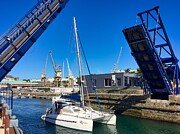 Harbor Passage Cape Town's Sailboat Journey Photograph by Travel Essayist