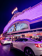 Harrahs Las Vegas lit up on the strip at night Photograph by FeelingVegas Wall Art and Prints