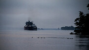 Lake Freighter in the Misty Morning Photograph by Deb Beausoleil