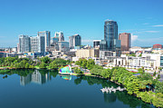 Orlando Skyline with Lake Eola Photograph by Michael Warren