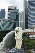 Singapore's Merlion Statue Amidst Skyscrapers Photograph by Travel Essayist