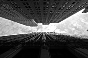 Skyward Convergence, Urban Giants Amidst Clouds Photograph by Travel Essayist