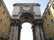 Symmetrical Lisbon, Ornate Stone Arch and Yellow Buildings Photograph by Travel Essayist