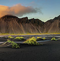 Sunset above  Vestrahorn and its black sand beach in Iceland #1 Photograph by Miroslav Liska