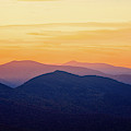 Mountain Light And Silhouette Photograph by Jeff Sinon