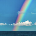 White Clouds Blue Skies and Rainbows in Mazatlan Mexico #1 Photograph by Tommy Farnsworth