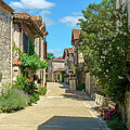 Picturesque architecture in early summer sunshine in Pujols, Lot #3 by Seeables Visual Arts