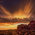 Arches Sunset Crepuscular Rays by Dan Norris