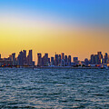 Doha Skyline at Sunset Across the Arabian Gulf by Miroslav Liska