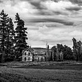 Homestead Beneath the Storm  Black and White Farmhouse Landscape by Kevin Schwalbe