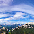Lenticular Clouds over the Rockies by Tommy Farnsworth