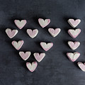 Love heart marshmallows spelling out i love you top view by Scott Lyons